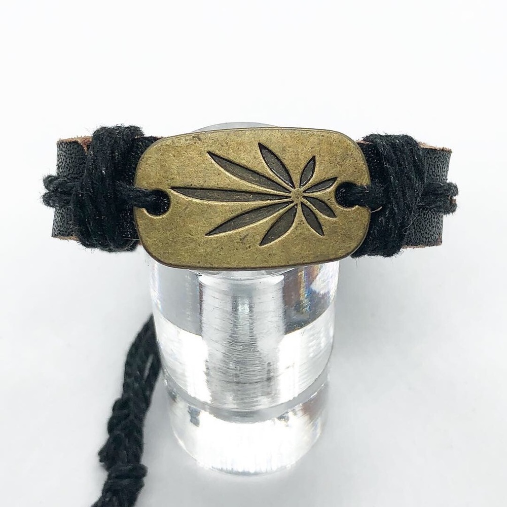 Black leather bracelet.